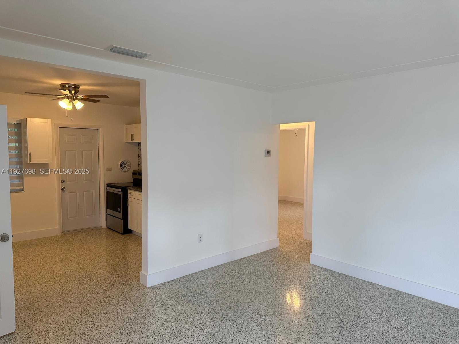 7071 Southwest 4th Street, Unit 2 Miami, FL 33144 - Photo 21 of 27 an empty room with a bathroom