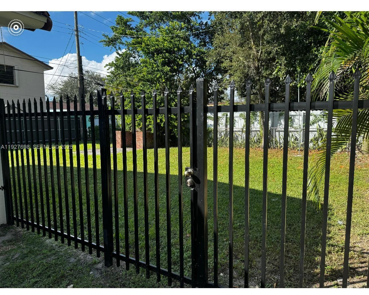 7071 Southwest 4th Street, Unit 2 Miami, FL 33144 - Photo 26 of 27 a view of a black gate
