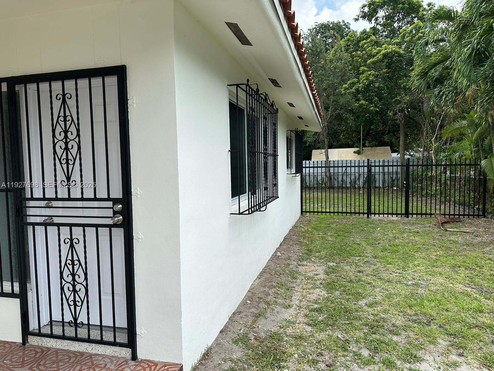 7071 Southwest 4th Street, Unit 2 Miami, FL 33144 - Photo 4 of 27 a view of outdoor space