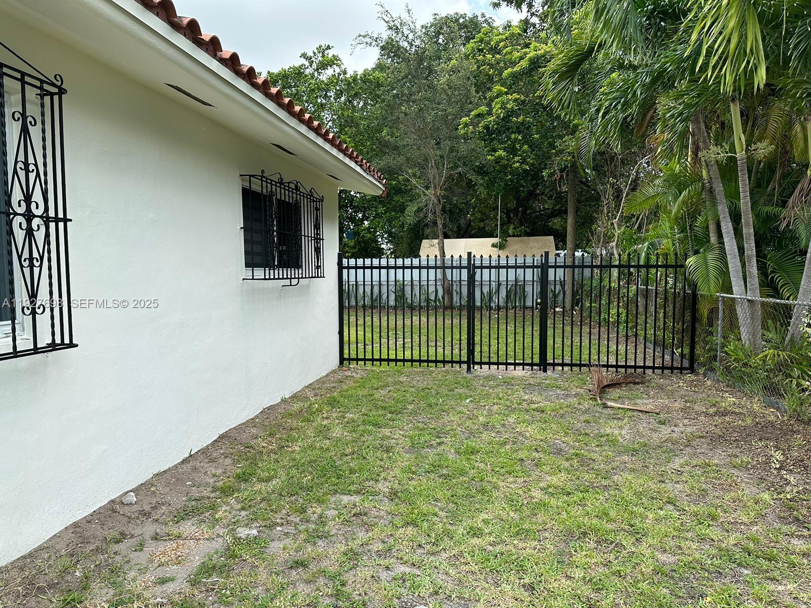 7071 Southwest 4th Street, Unit 2 Miami, FL 33144 - Photo 6 of 27 a view of a backyard