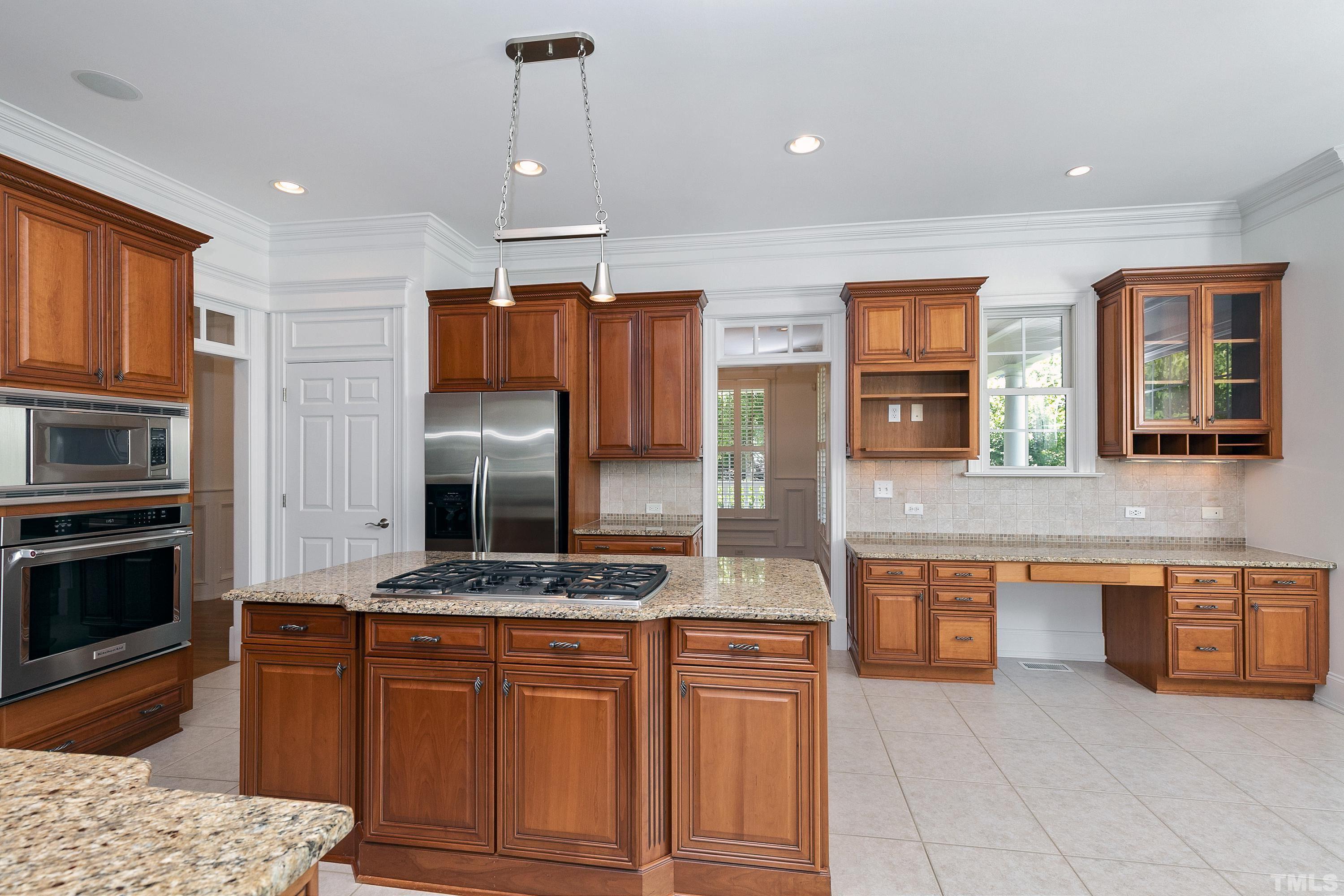 202 Simerville Road Chapel Hill, NC 27517 - Photo 15 of 51 a kitchen with stainless steel appliances granite countertop a stove and a sink
