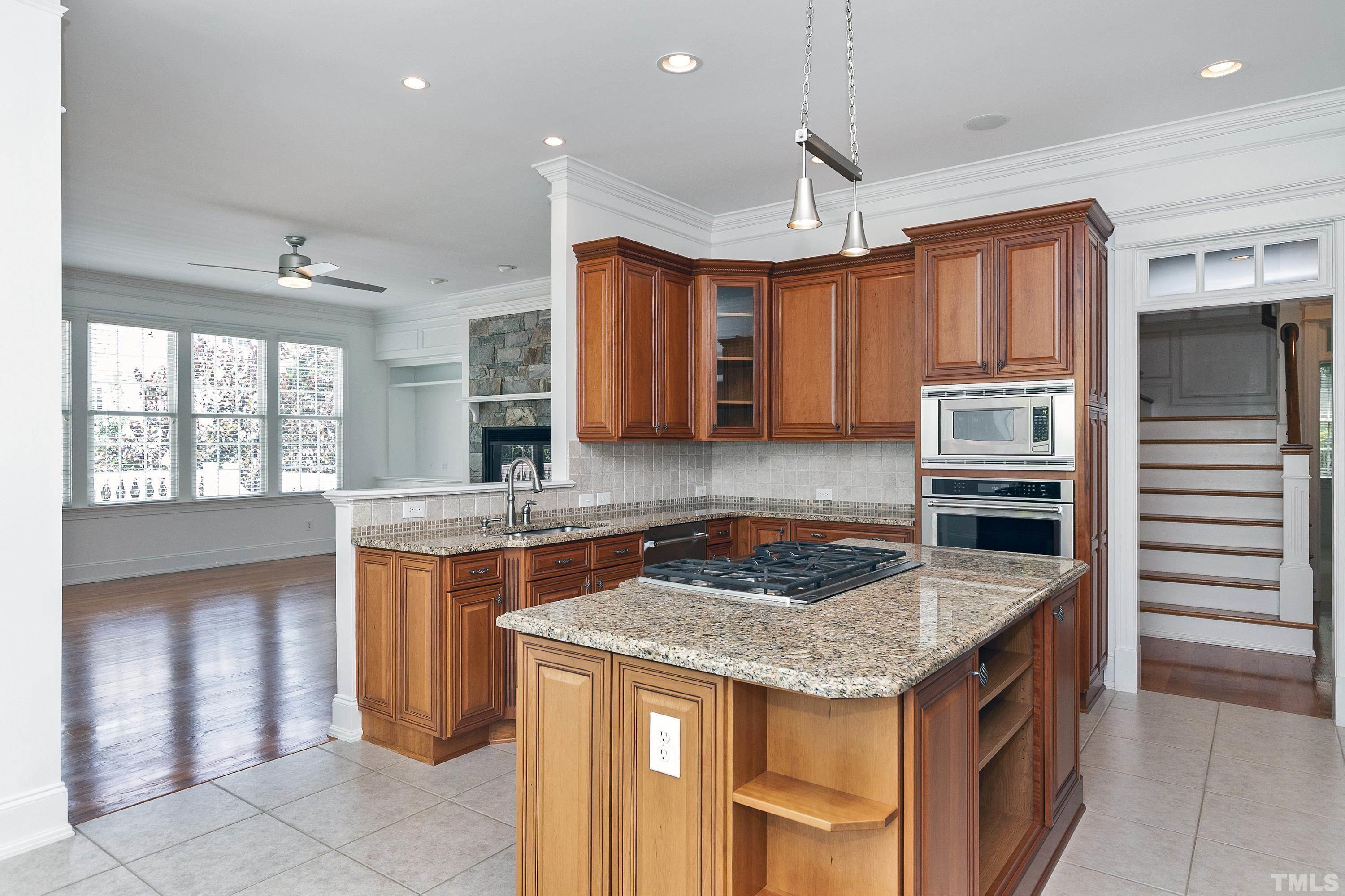 202 Simerville Road Chapel Hill, NC 27517 - Photo 18 of 51 a kitchen with stainless steel appliances granite countertop a stove and a sink