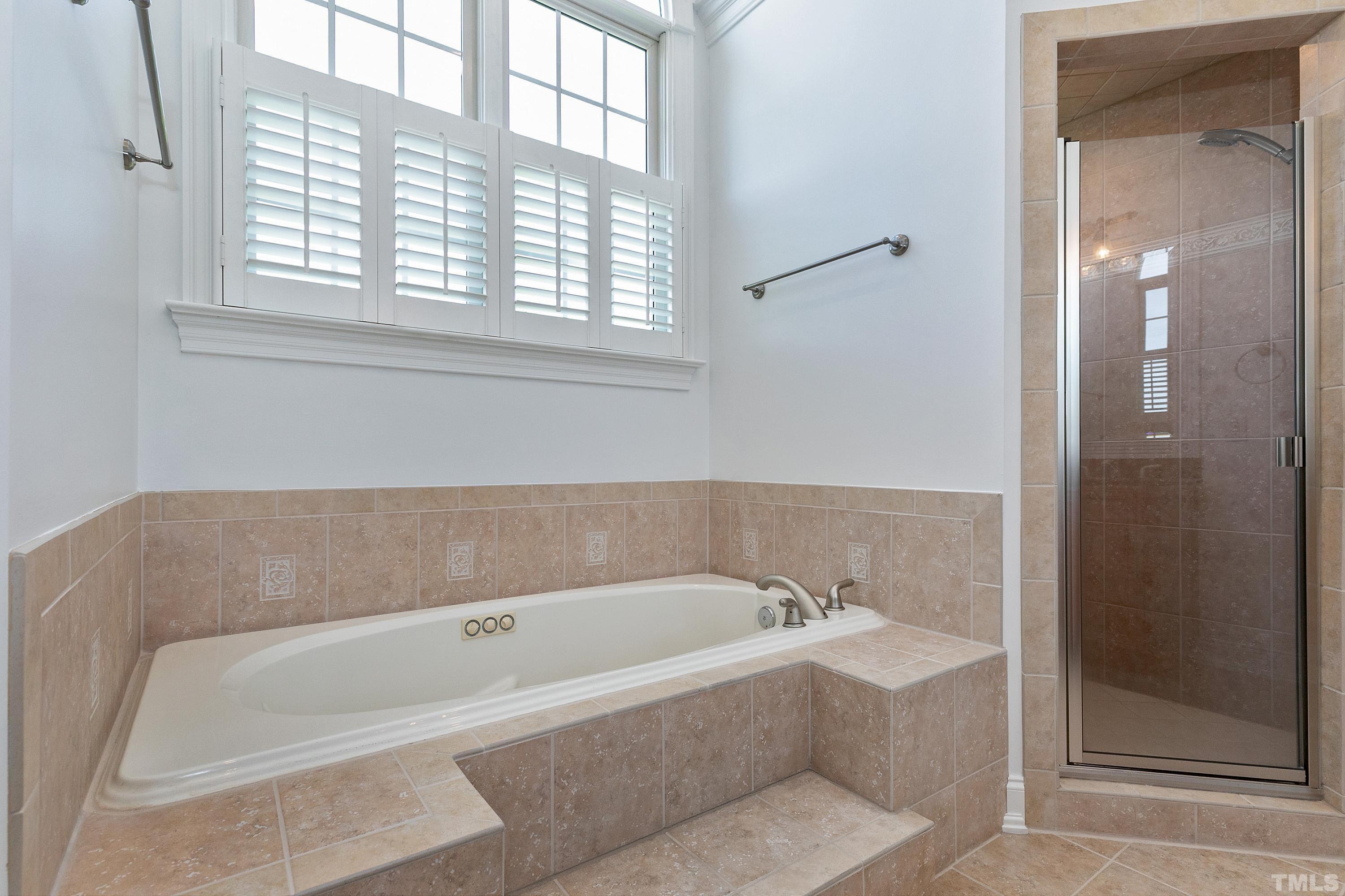 202 Simerville Road Chapel Hill, NC 27517 - Photo 28 of 51 a bathroom with a bathtub and shower