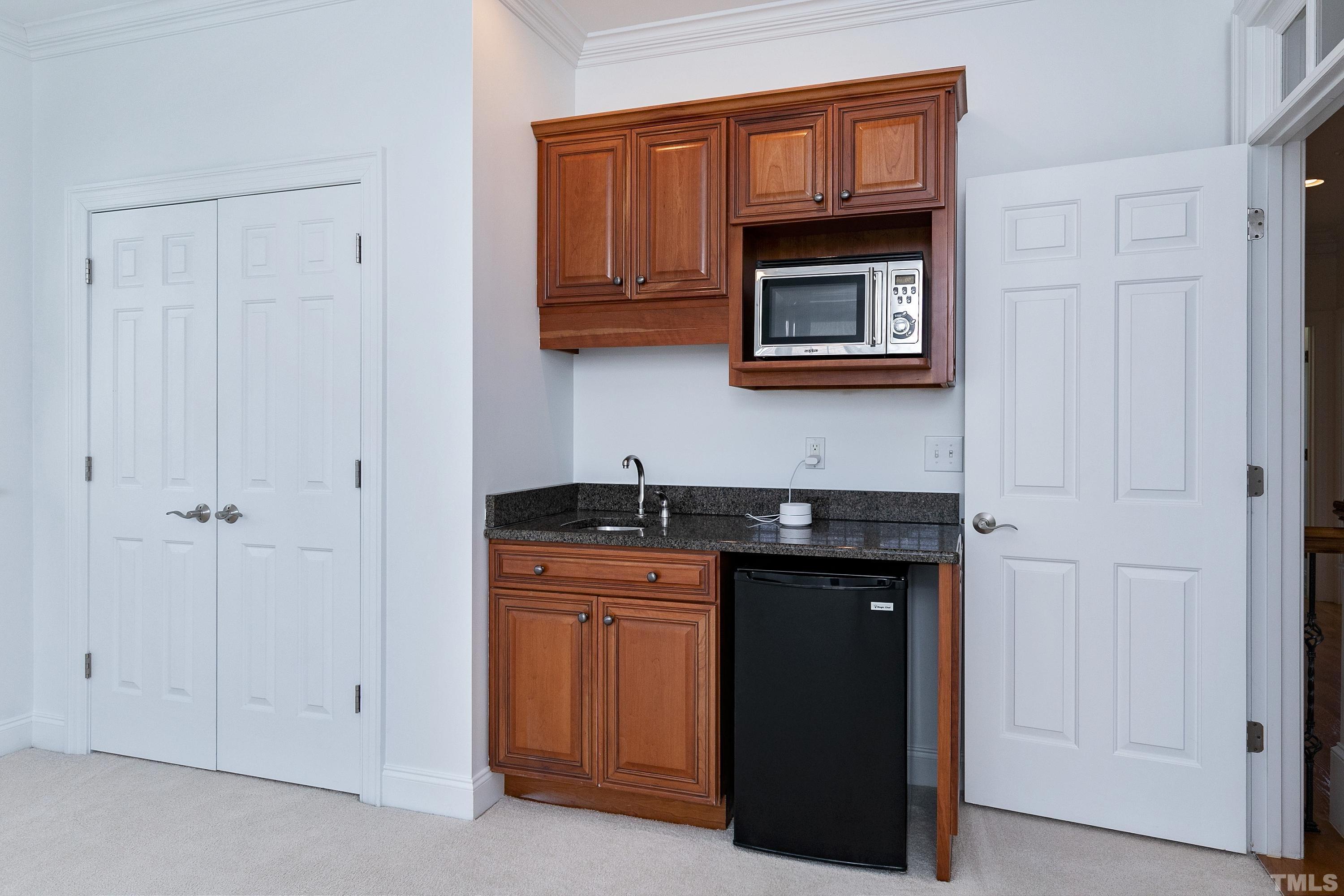 202 Simerville Road Chapel Hill, NC 27517 - Photo 32 of 51 a kitchen with stainless steel appliances granite countertop a stove and a refrigerator