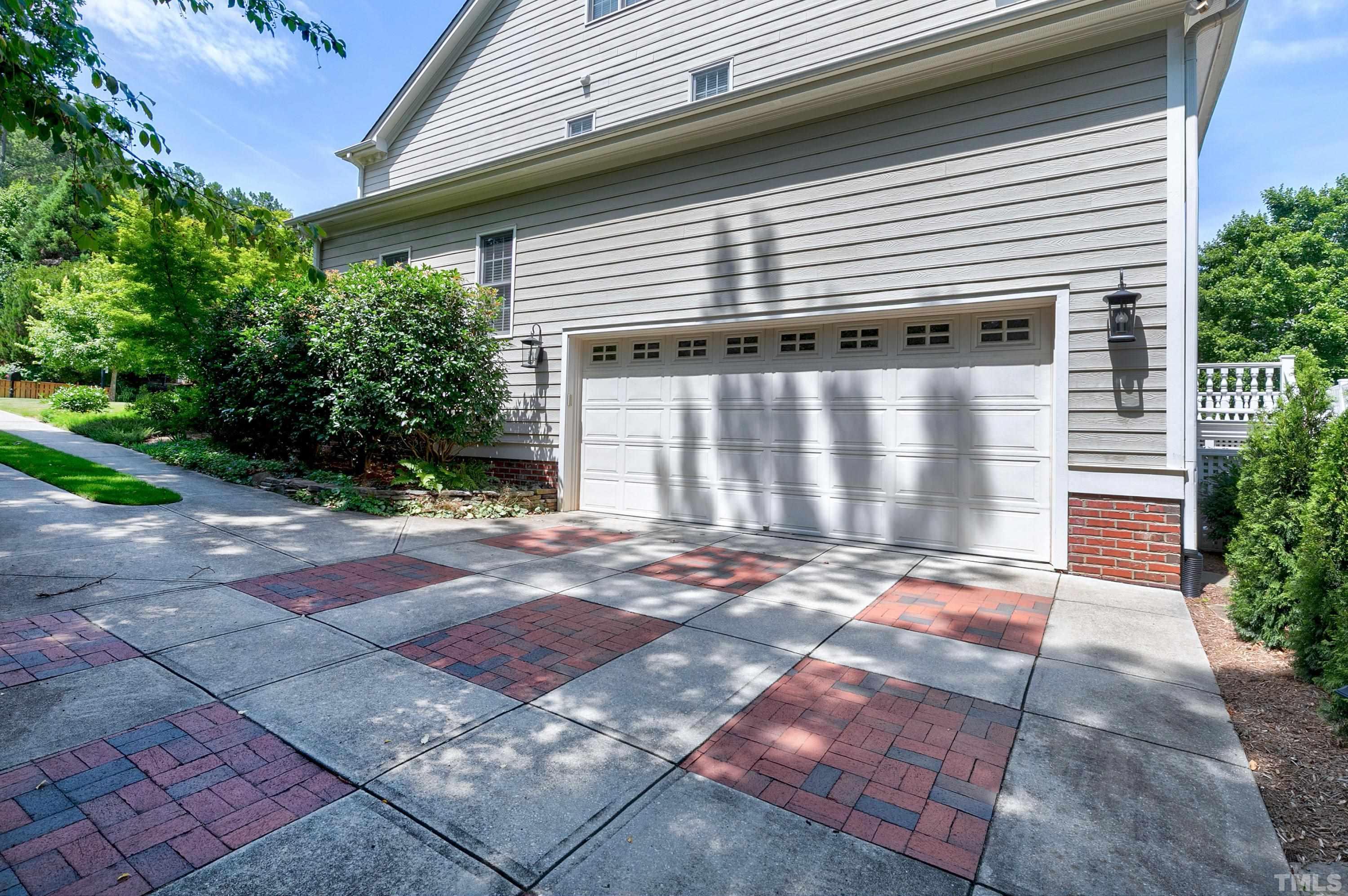 202 Simerville Road Chapel Hill, NC 27517 - Photo 44 of 51 a front view of a house with a yard and garage
