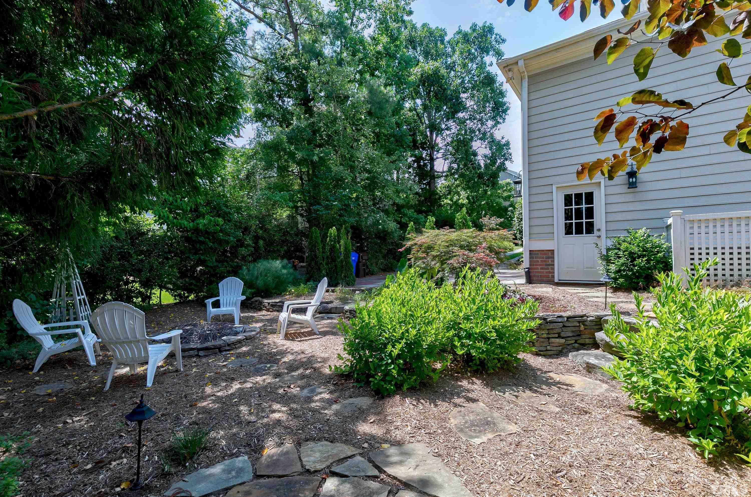 202 Simerville Road Chapel Hill, NC 27517 - Photo 48 of 51 a view of a chairs and table in backyard