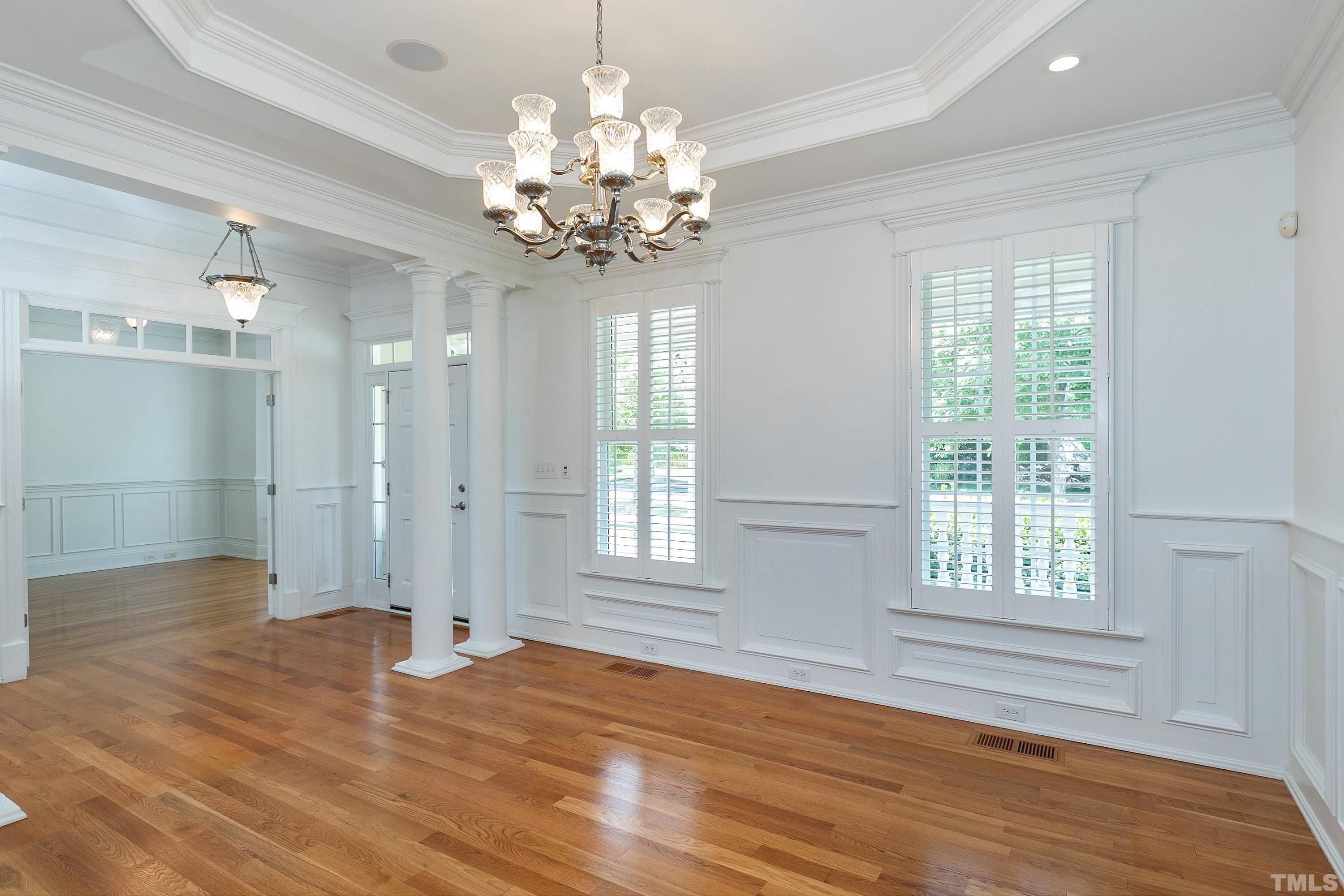 202 Simerville Road Chapel Hill, NC 27517 - Photo 7 of 51 a view of an empty room with wooden floor and a window