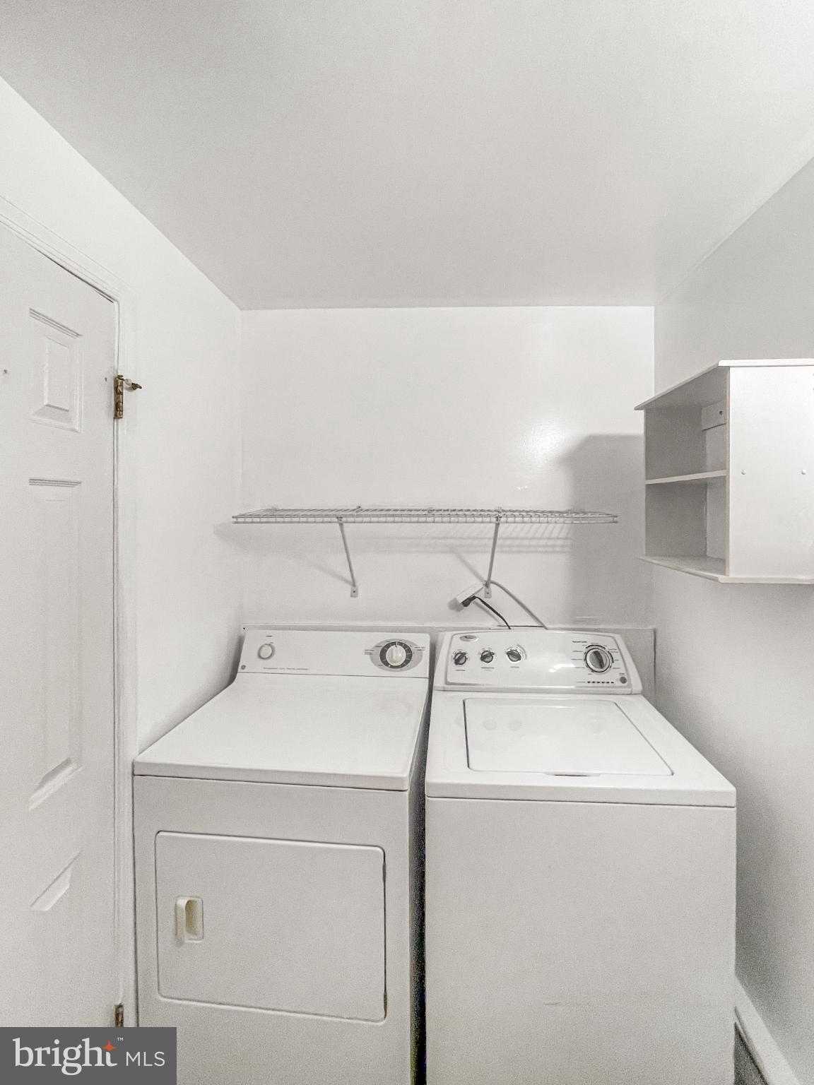 1436 Light Street Baltimore, MD 21230 - Photo 14 of 21 a utility room with dryer and washer
