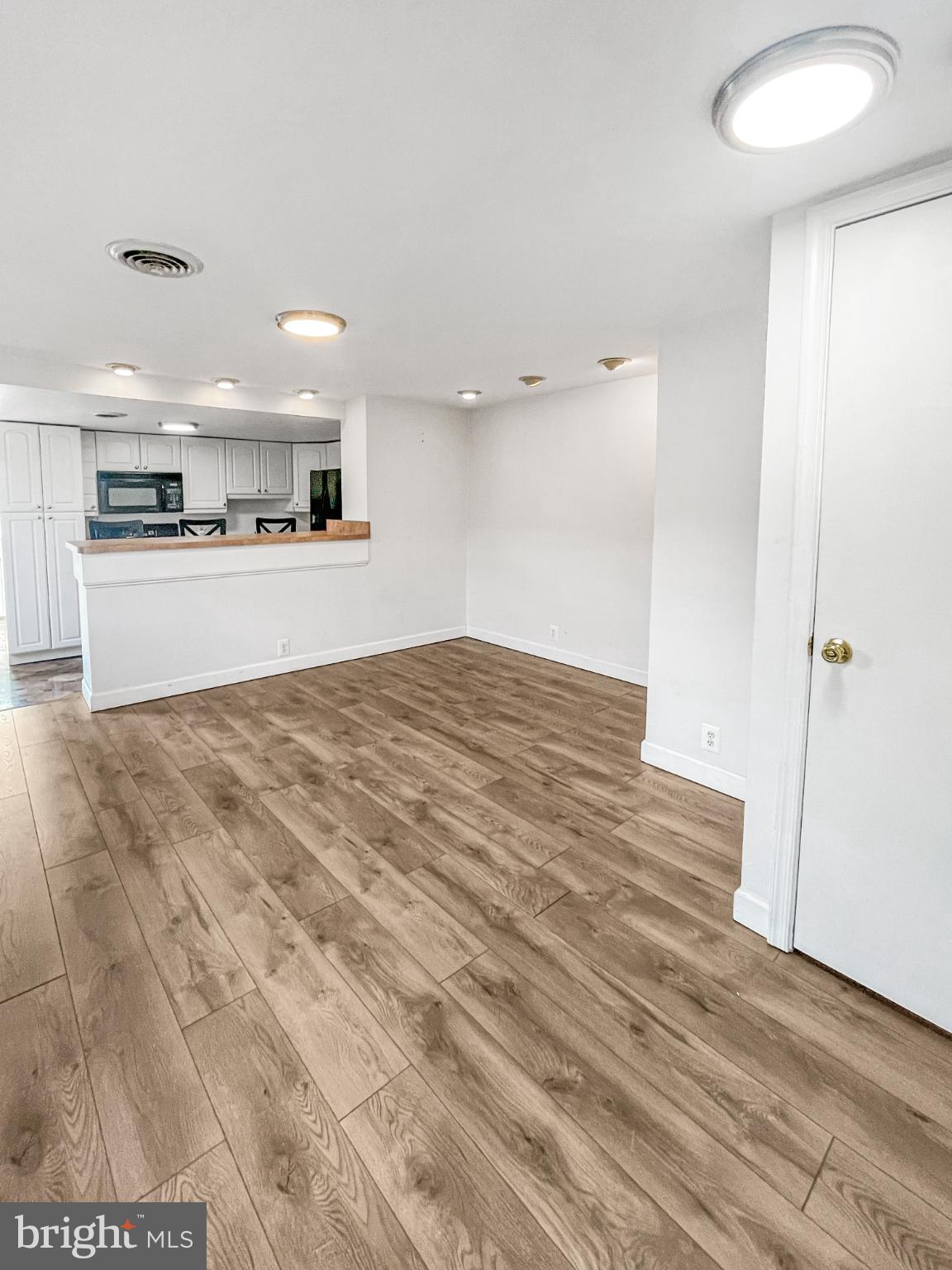 1436 Light Street Baltimore, MD 21230 - Photo 17 of 21 a view of kitchen with cabinets and wooden floor