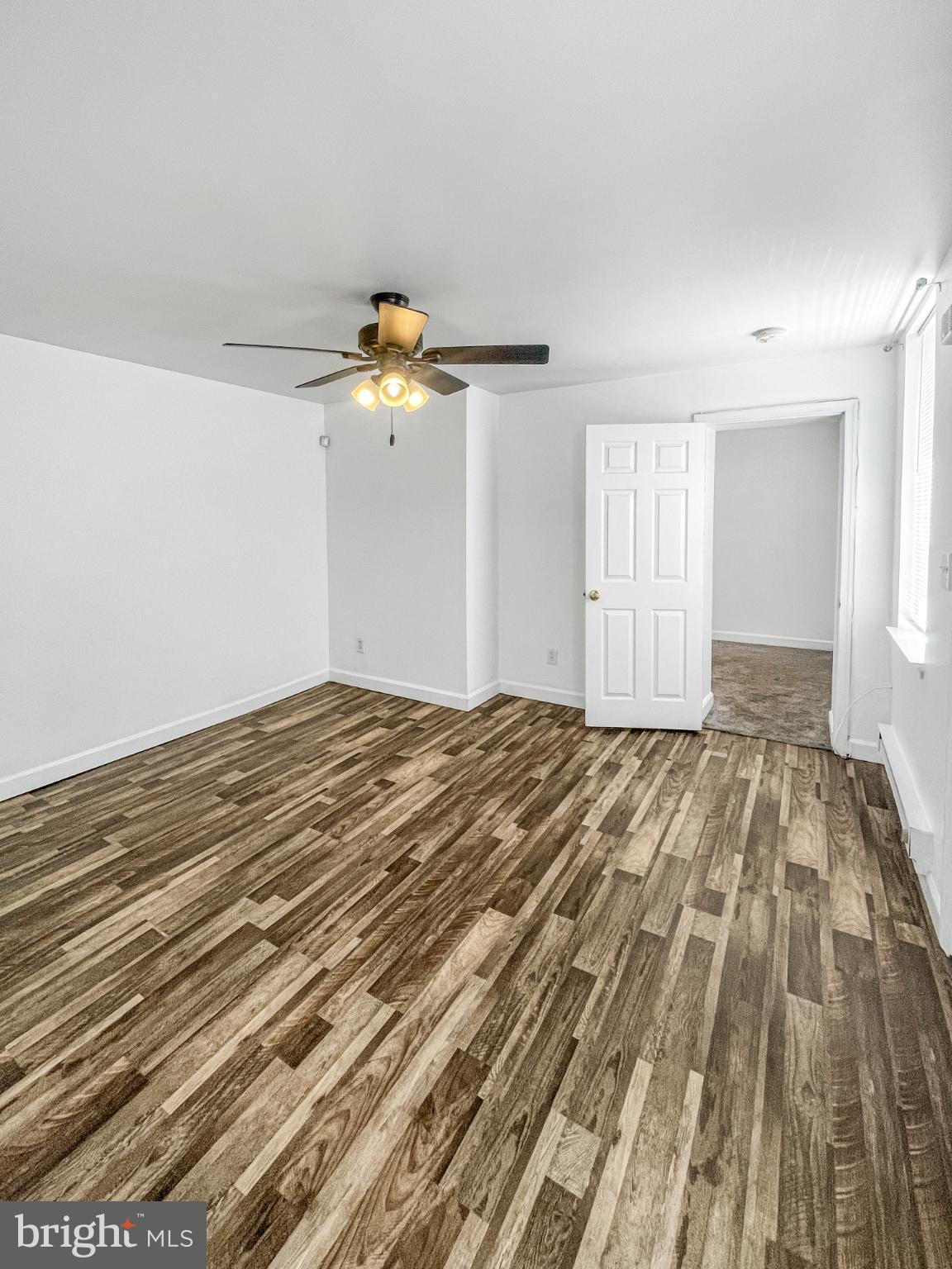 1436 Light Street Baltimore, MD 21230 - Photo 9 of 21 a view of a room with wooden floor