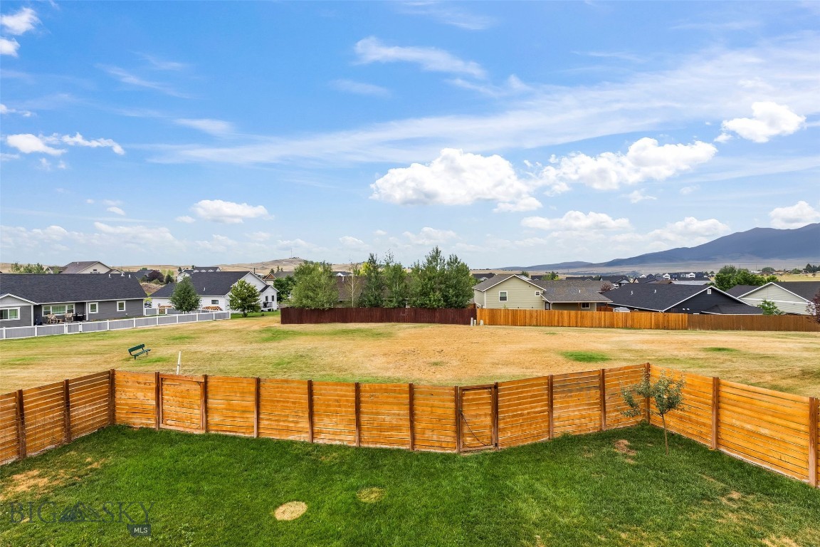 1122 Ridgeview Trail Livingston, MT 59047 - Photo 3 of 75 Open park space beyond the fenced and gated yard