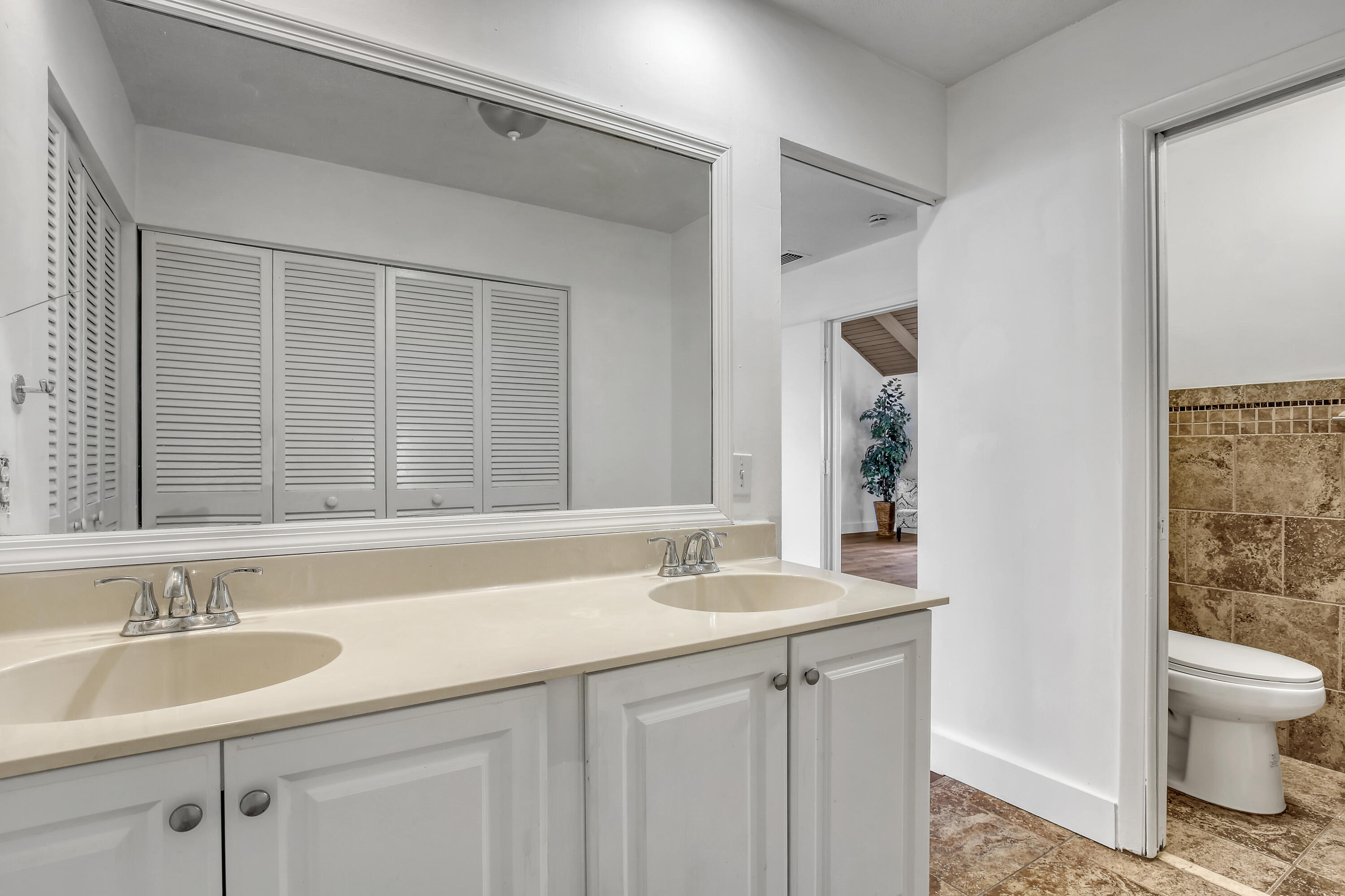 241 Northwest 15th Street Boca Raton, FL 33432 - Photo 26 of 34 a bathroom with a sink and a toilet