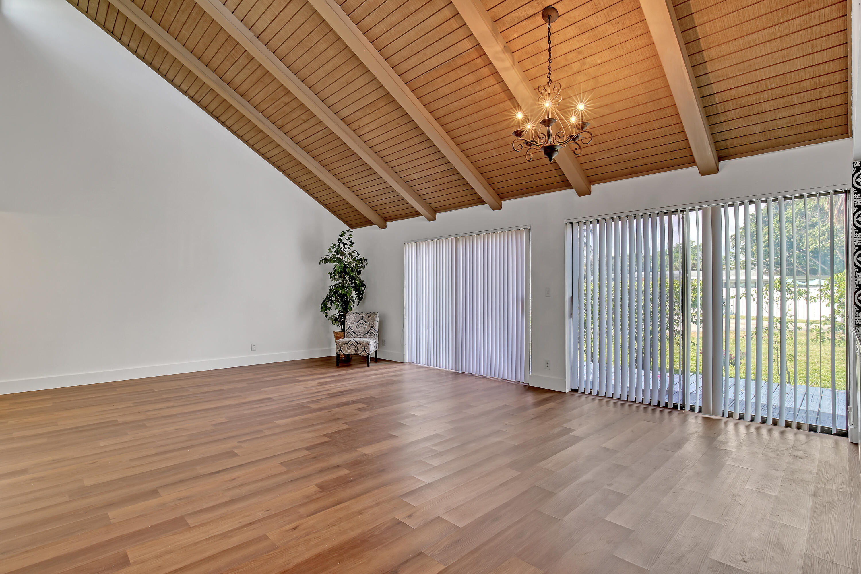 241 Northwest 15th Street Boca Raton, FL 33432 - Photo 8 of 34 a view of a patio with wooden floor