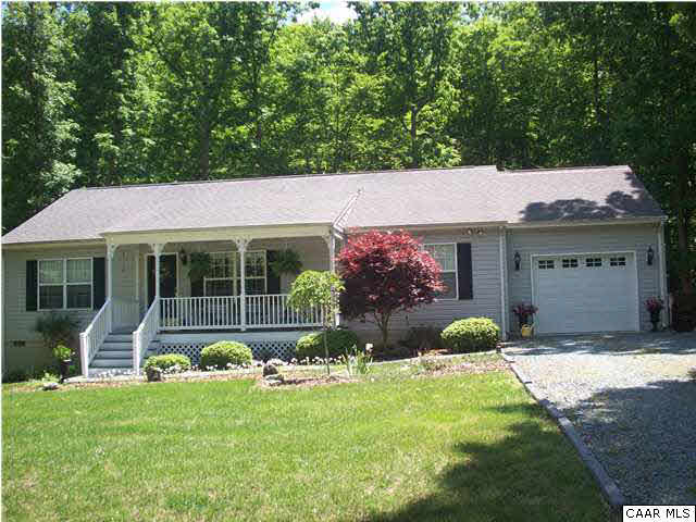 91 Riverside Drive Palmyra, VA 22963 - Photo 30 of 31 a front view of a house with a yard and porch