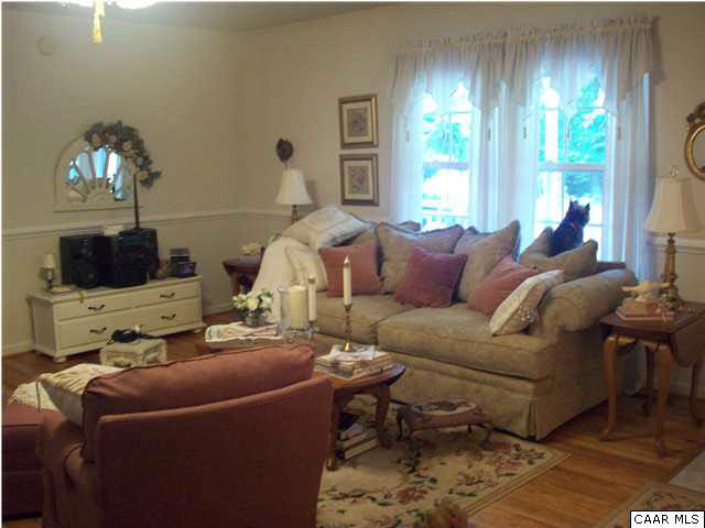 91 Riverside Drive Palmyra, VA 22963 - Photo 5 of 31 a living room with furniture and a large window