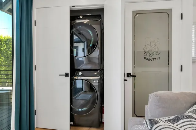 a bedroom with a large bed and a couch