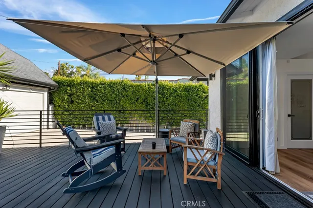 a outdoor space with patio the couches and a potted plant