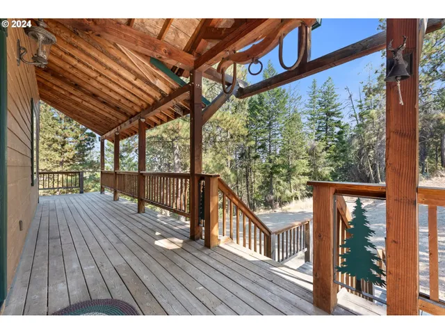 a view of balcony with wooden floor