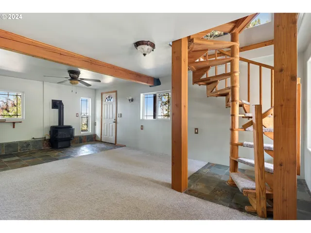 a view of an empty room and window