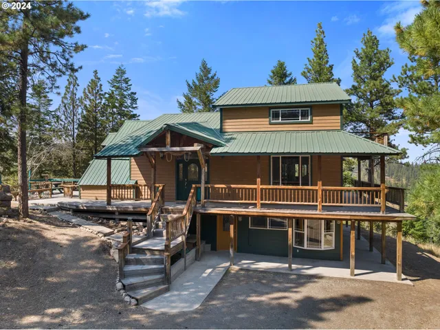 a front view of a house with a porch