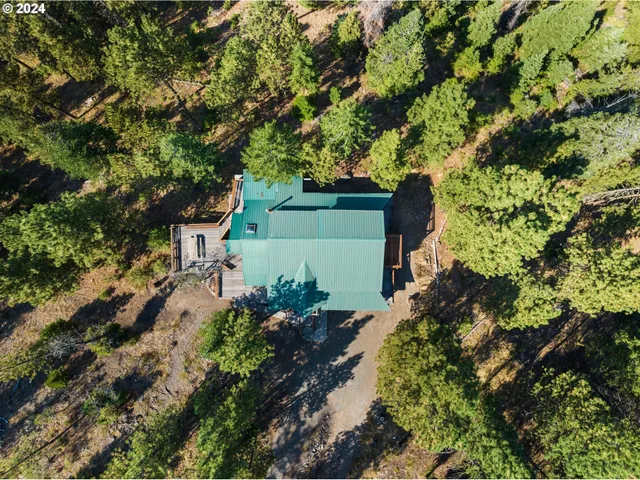 a view of balcony with wooden floor