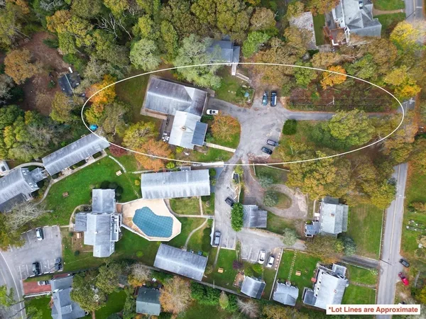 an aerial view of houses with outdoor space