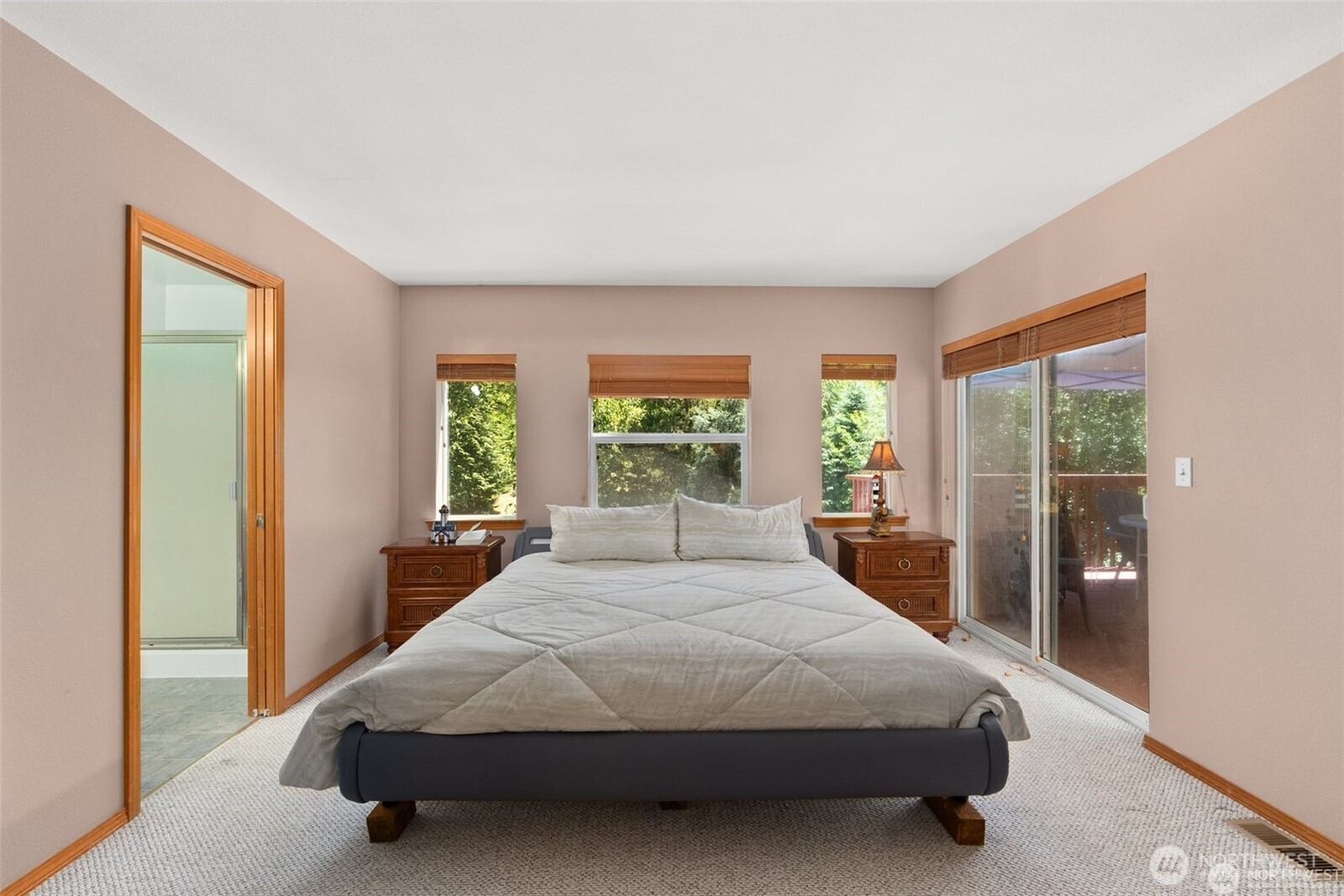 104 Walsh Lane Chehalis, WA 98532 - Photo 14 of 30 a bedroom with a large bed and a large window