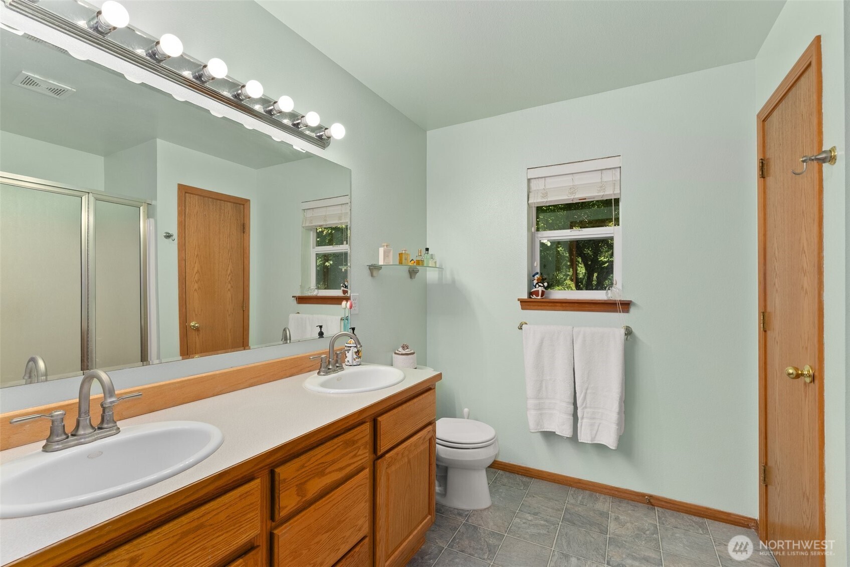 104 Walsh Lane Chehalis, WA 98532 - Photo 15 of 30 a bathroom with a toilet sink and mirror