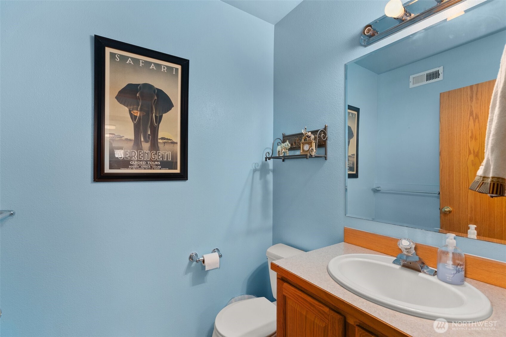 104 Walsh Lane Chehalis, WA 98532 - Photo 18 of 30 a bathroom with a toilet sink and mirror
