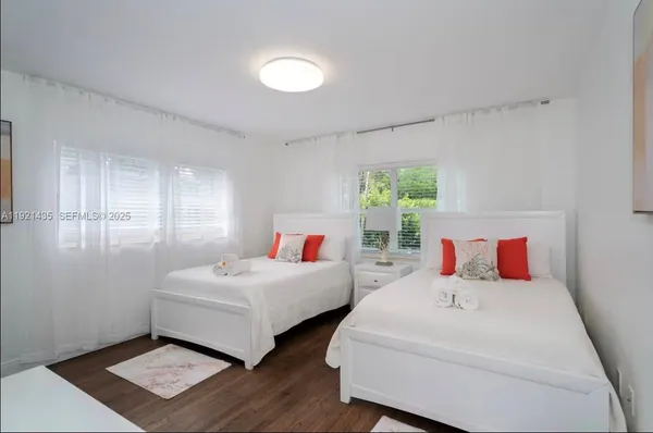 a living room with furniture and window