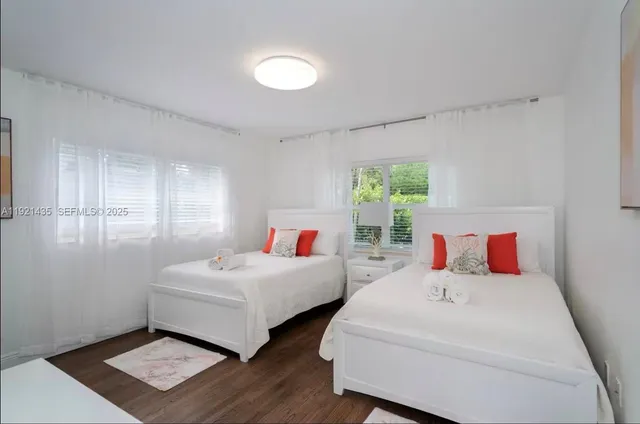 a living room with furniture and window