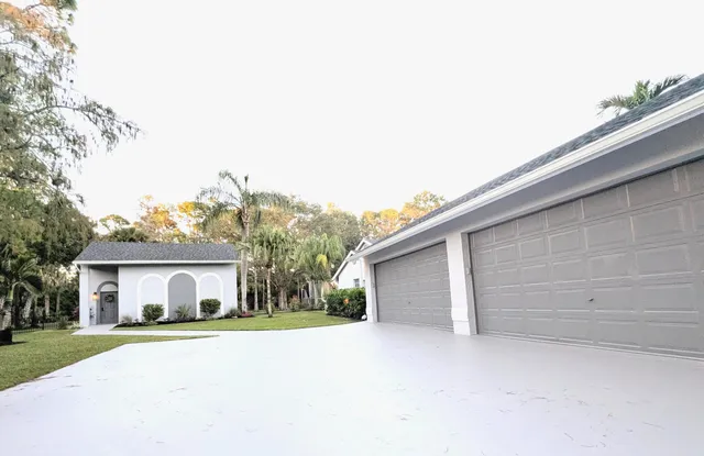 a view of an empty room with glass door
