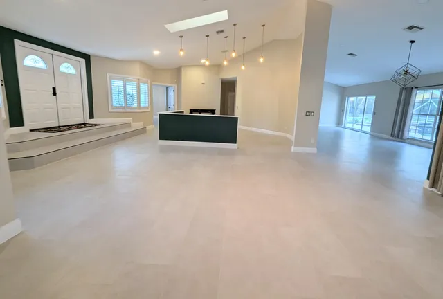 an empty room with closet area