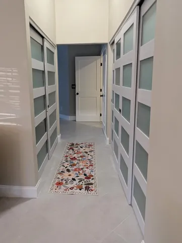 a view of a backyard with sitting area