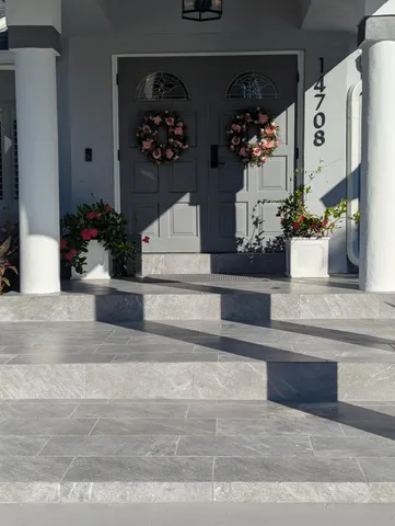 a view of a house with a street