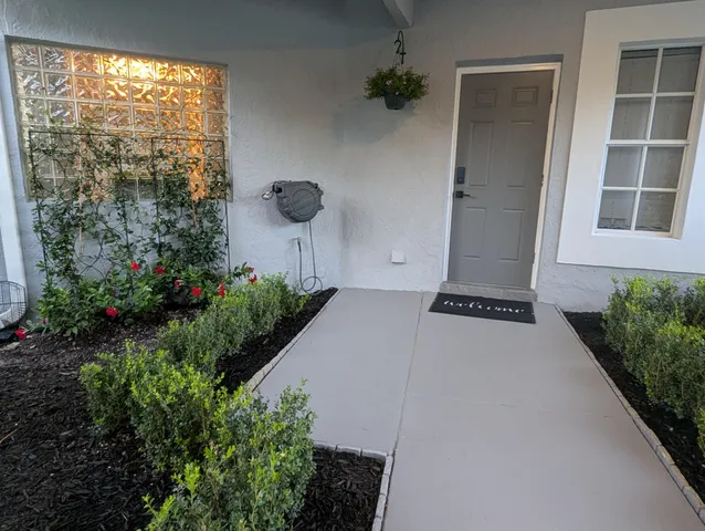 a view of a room with a large window