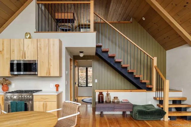 a view of a kitchen with furniture and a kitchen