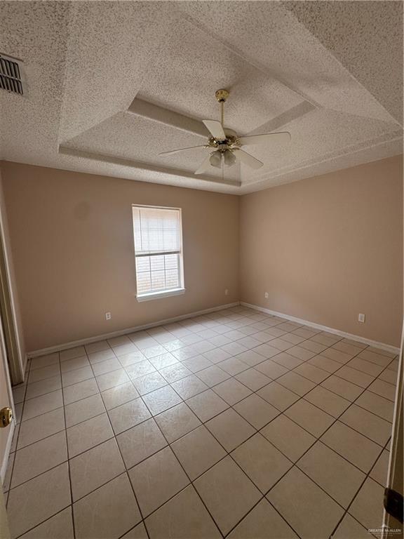 6701 North 7th Street, Unit 3 McAllen, TX 78504 - Photo 6 of 9 an empty room with windows