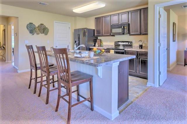 717 Widgeon Way Crestview, FL 32539 - Photo 2 of 19 Aria kitchen 1
