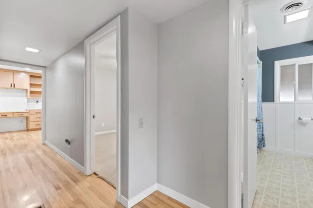 a view of a house with yard and porch