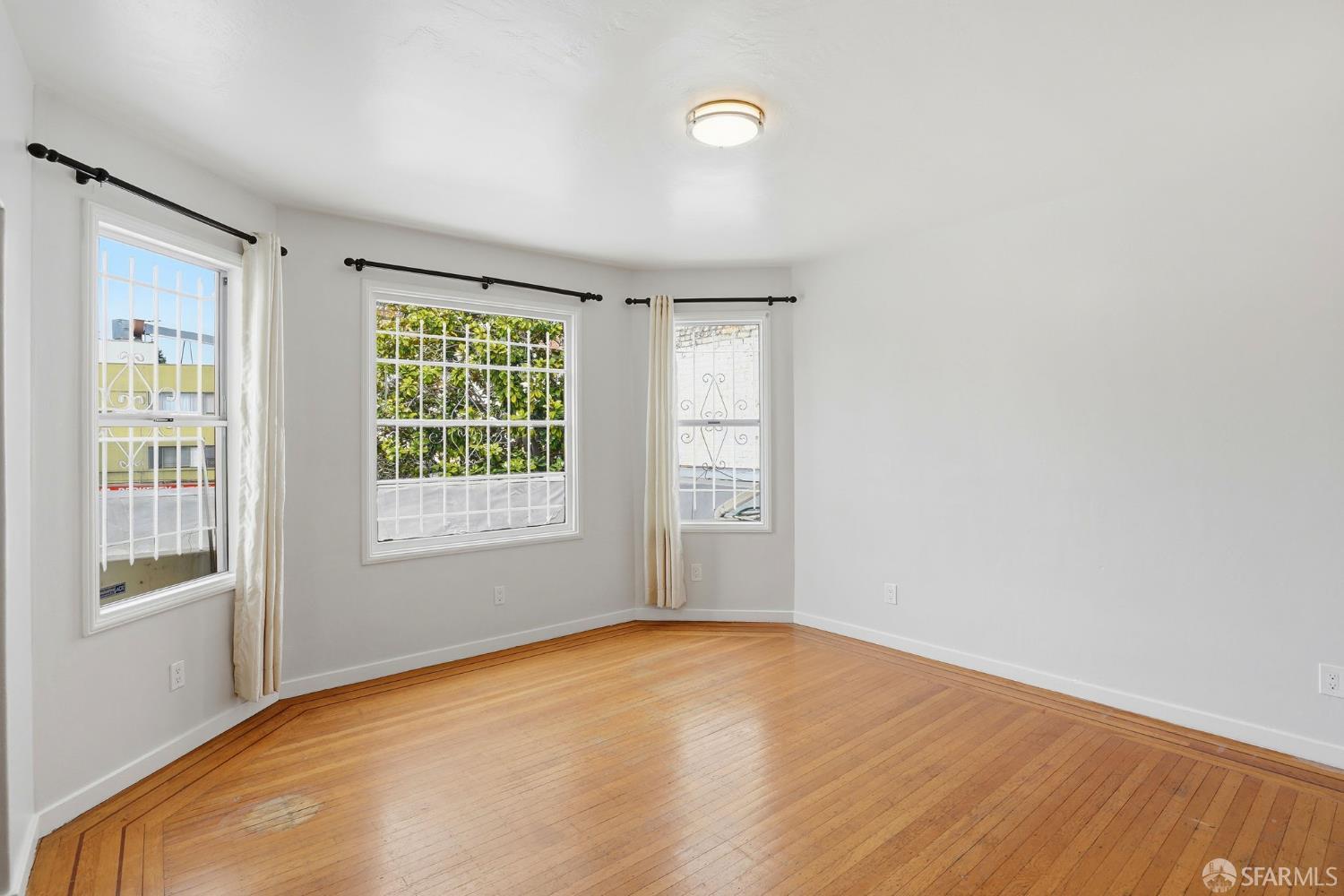 2811-2815 Telegraph Avenue Berkeley, CA 94705 - Photo 19 of 73 a view of an empty room with a window