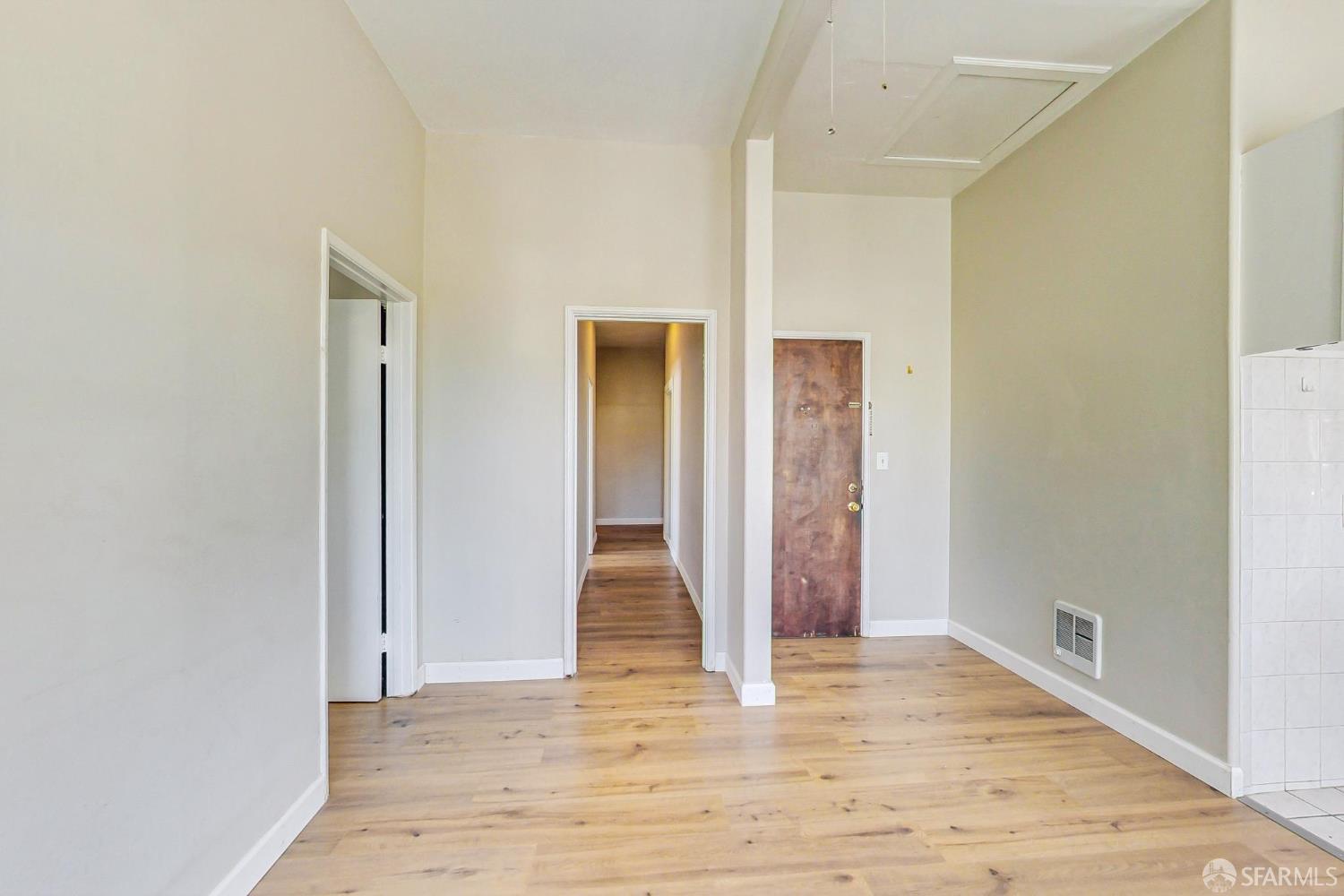 2811-2815 Telegraph Avenue Berkeley, CA 94705 - Photo 41 of 73 a view of an empty room with wooden floor
