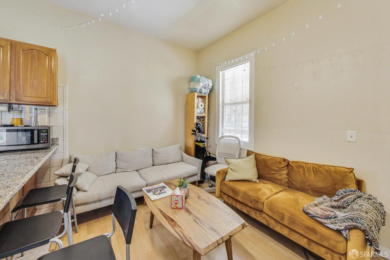 2811-2815 Telegraph Avenue Berkeley, CA 94705 - Photo 53 of 73 a living room with furniture and a couch