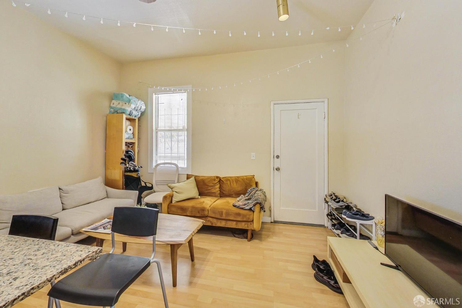 2811-2815 Telegraph Avenue Berkeley, CA 94705 - Photo 55 of 73 a living room with furniture and a couch