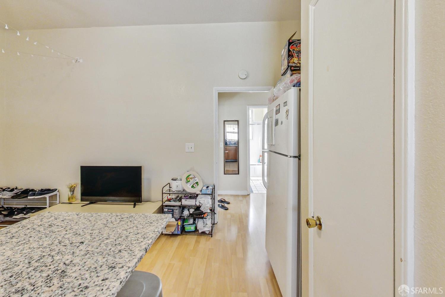 2811-2815 Telegraph Avenue Berkeley, CA 94705 - Photo 58 of 73 a living room with furniture rug and a flat screen tv