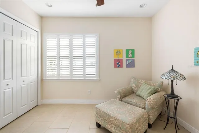 an aerial view of a house with outdoor space and lake view