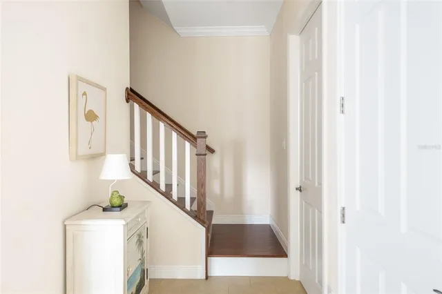 an aerial view of a house with a ocean view