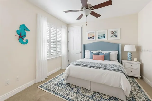 an aerial view of a house with a lake view