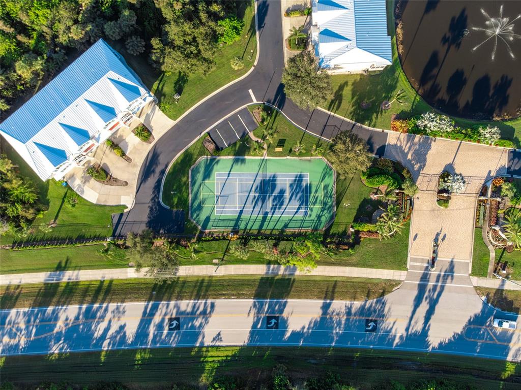 10311 Lands End Circle, Unit 16 Placida, FL 33946 - Photo 49 of 76 a view of a park with a bench and trees