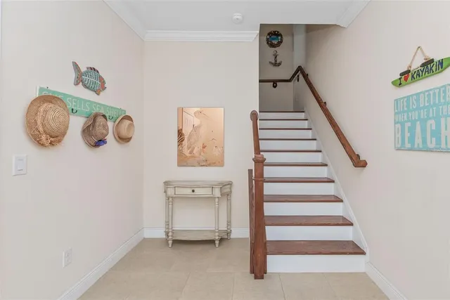 a dining room with furniture window and wooden floor